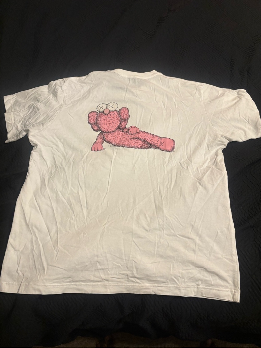 Uniqlo x KAWS White Tee with Pink KAWS Character Graphic. Open to offers!